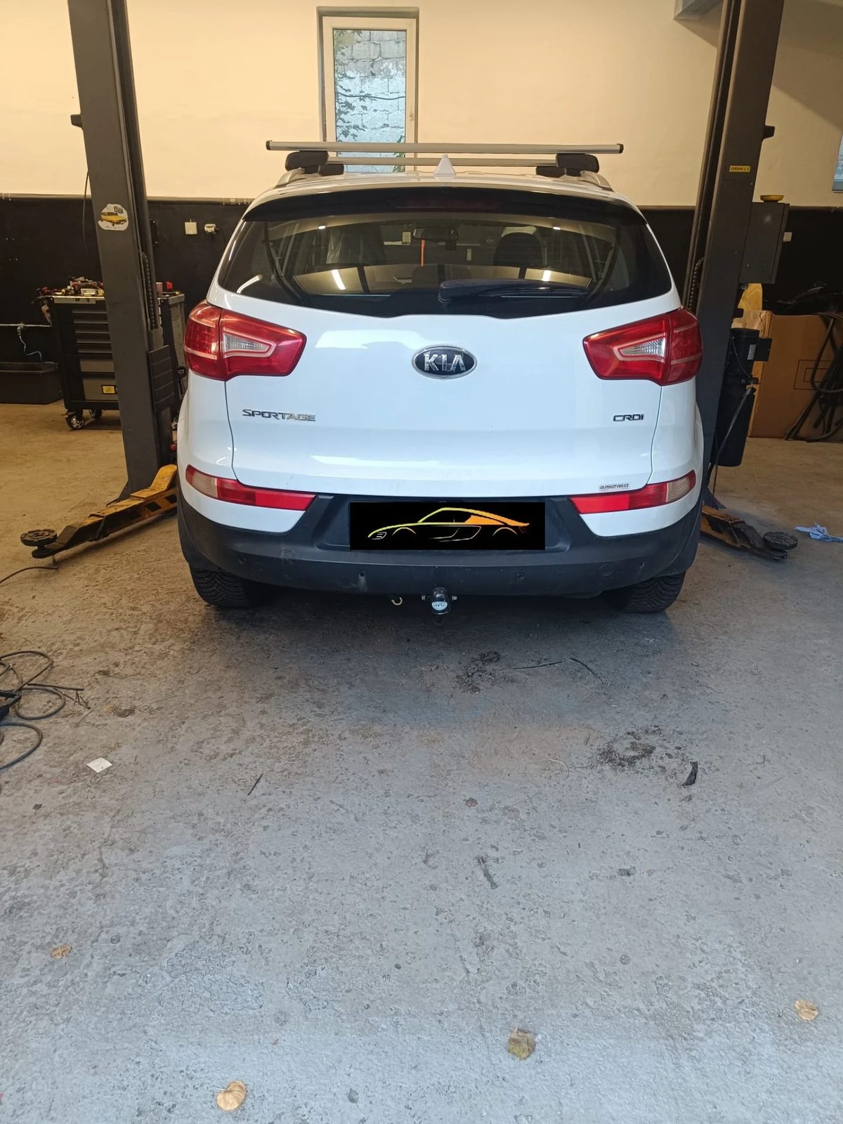 Kia Sportage se smontovaným tažným zařízením